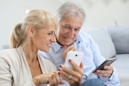 Old people using phones
